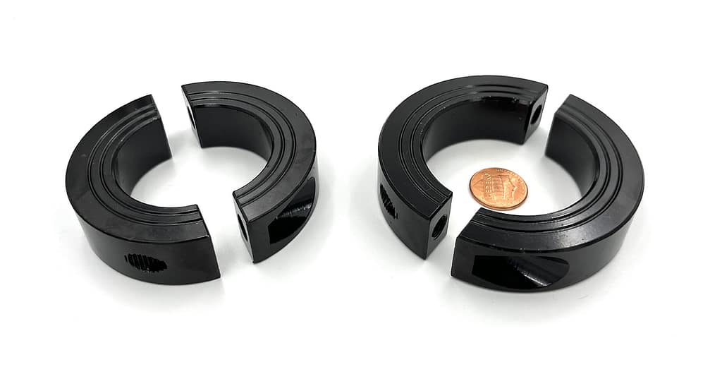 Custom automotive large shaft collars with black E Coating Manufactuers